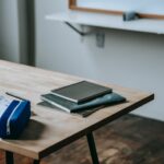 student desk with copybooks and pencil case
