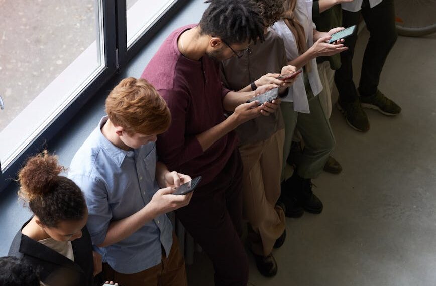 people holding their phones