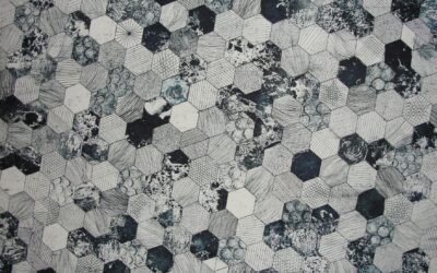 gray and black hive printed textile