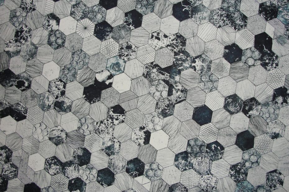 gray and black hive printed textile