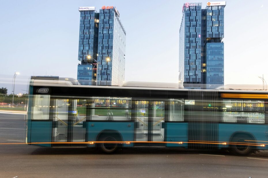 bucharest urban scene with modern buildings and bus